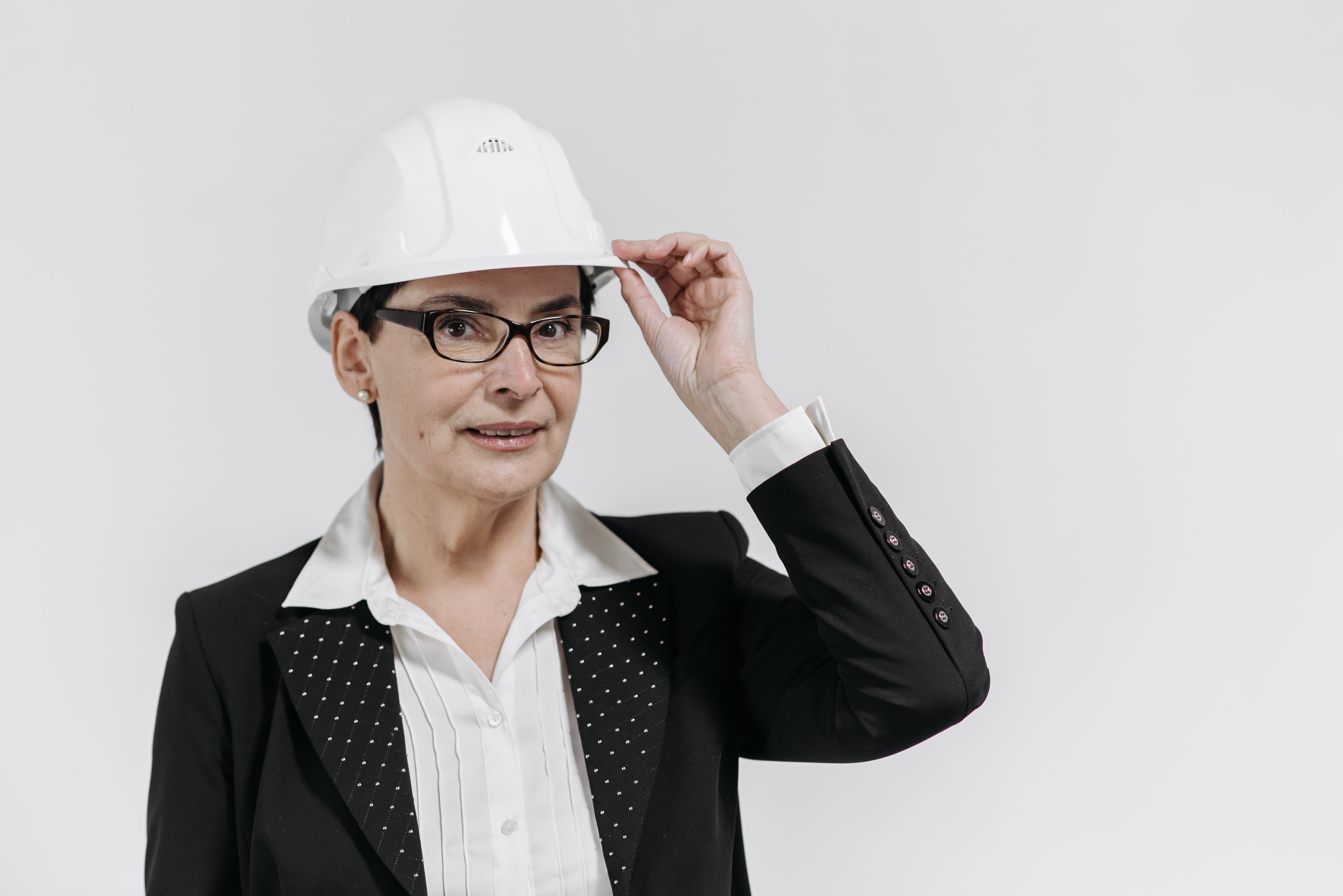 Construction and project professional wearing a safety helmet