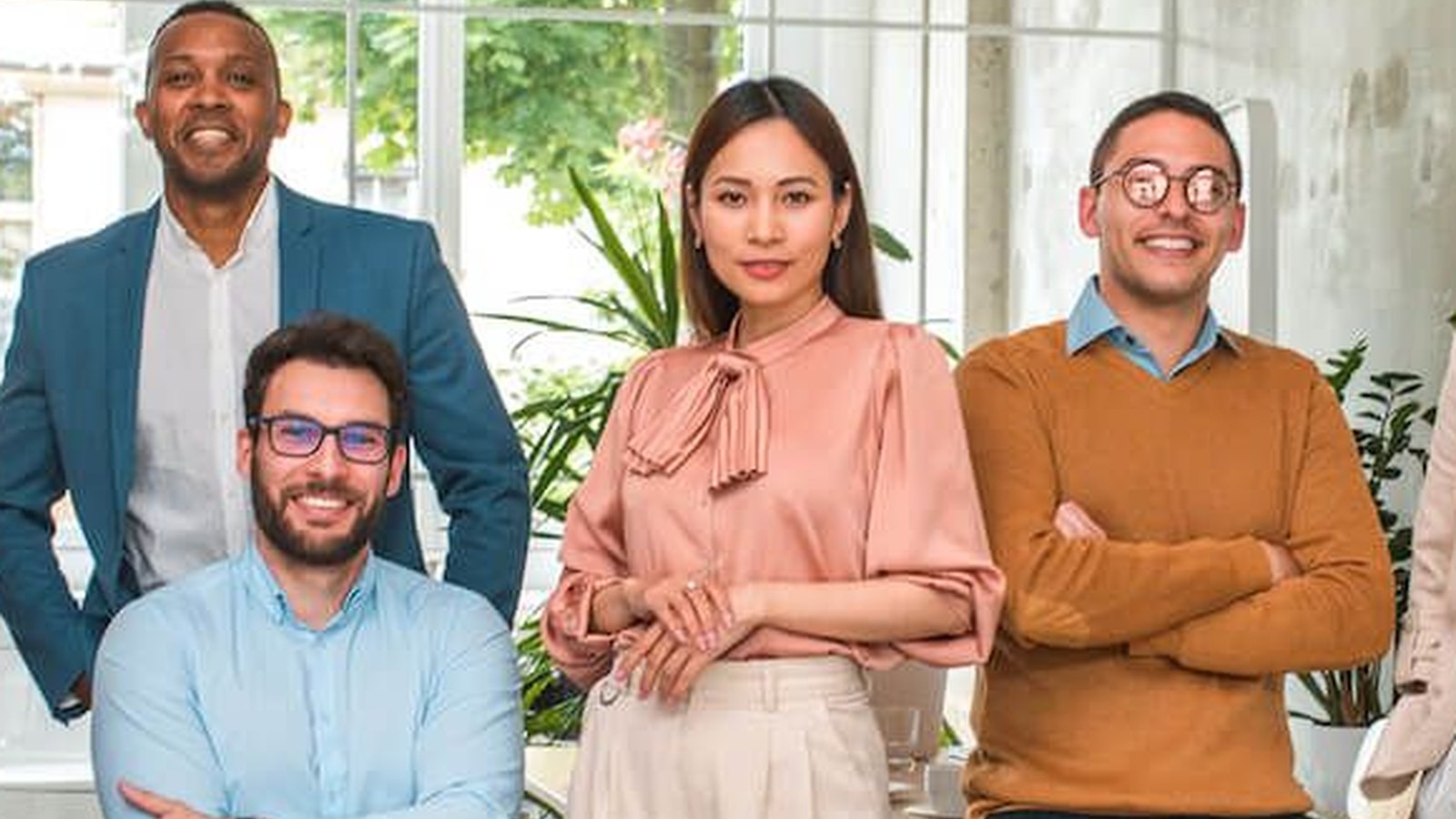 Professional legal and property advisory team facing the camera